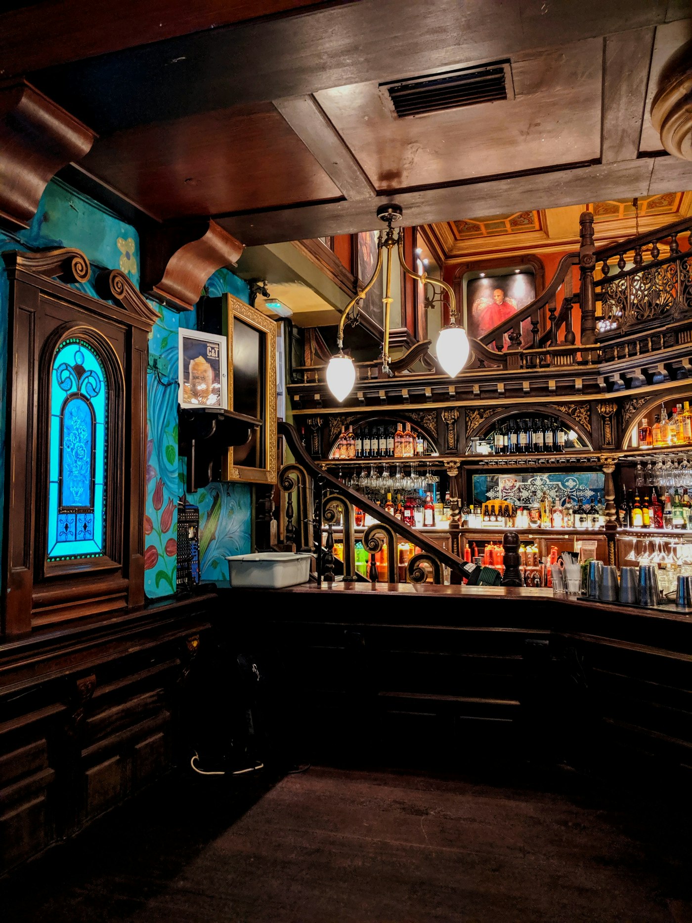 The bar and bottle shelves at Helm and Honey